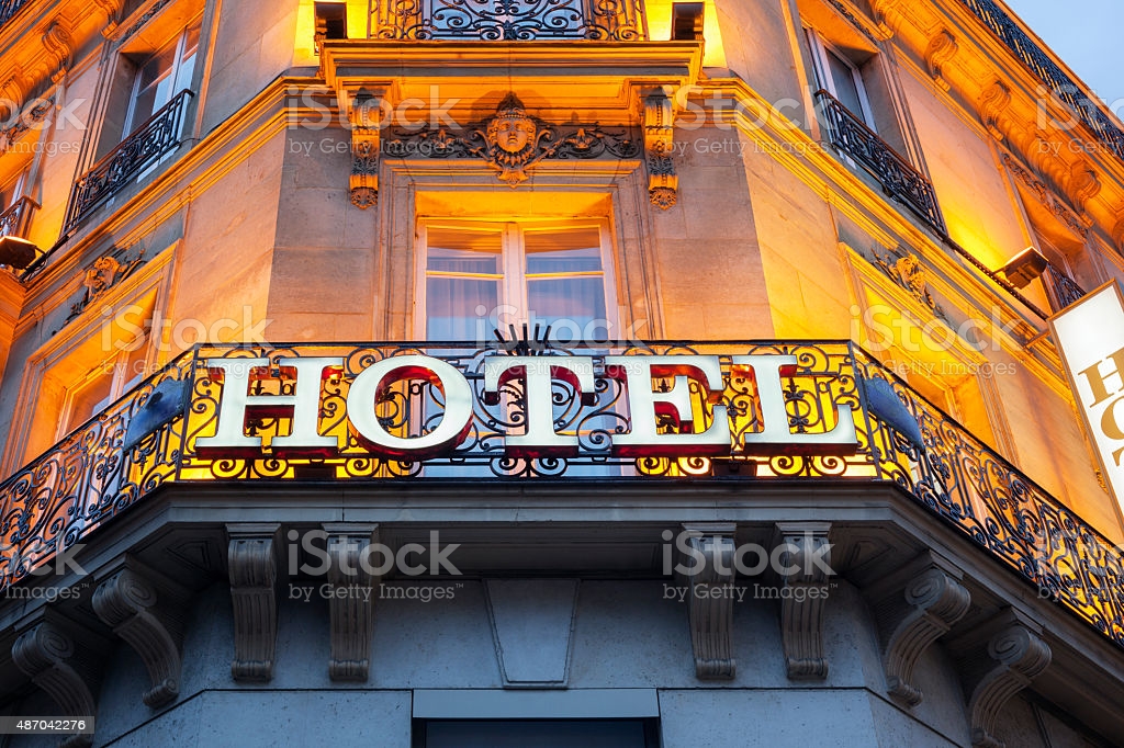 Illuminated hotel sign taken in Paris at night